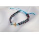 Bracelet perles artificielles avec croix en métal bleu