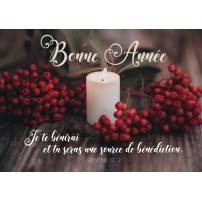 CARTE Fin d'année Bougie et branche de houx sur une table