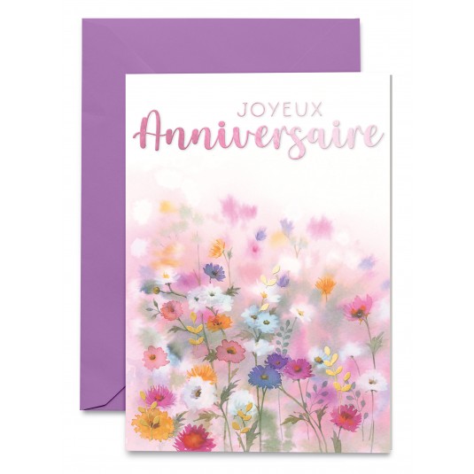 Carnet Anniversaire Champ de fleurs sur fond flou
