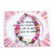 Bracelet perles plates et croix rose