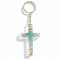 Porte-cl&eacute; croix avec inclusions de fleurs - turquoise