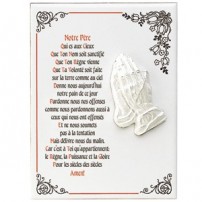 Céramique avec mains en prières en relief