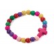 Bracelet extensible perles multicolores et croix rose en magnésite